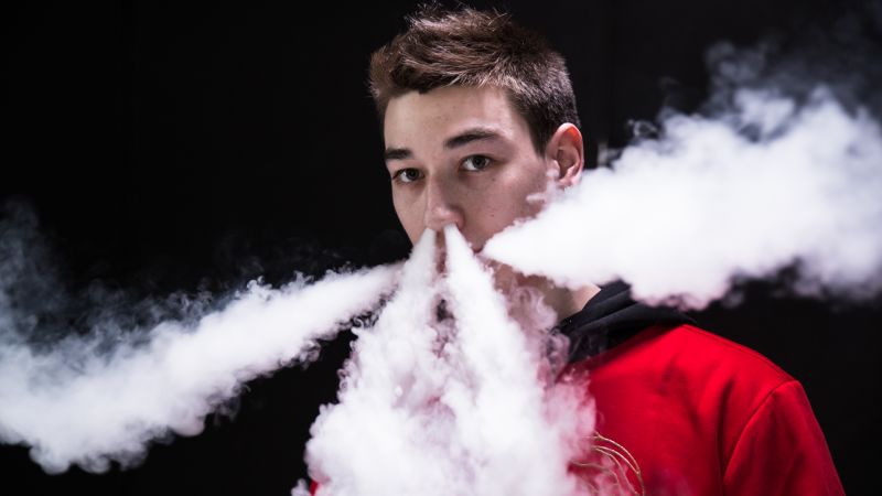 gq blowing-smoke-with-a-vape-god