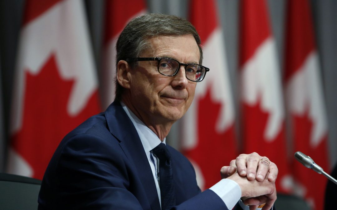 Bank of Canada ends QE; moves up timeline for rate hike